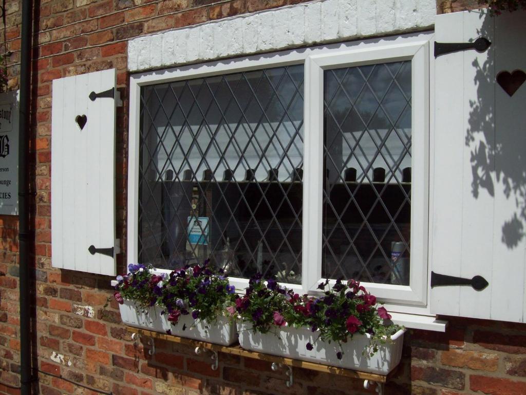 Fifth Milestone Cottage Dunnington Extérieur photo